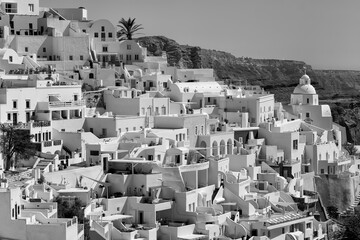 Panoramic view of the picturesque village of Fira Santorini with its hotels, restaurants and villas...