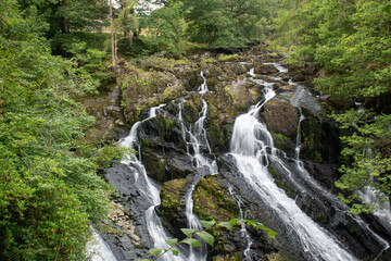 Fototapeta na wymiar Rhaeadr Ewynnol (Swallow Falls) waterfall, close to the town of Betws-y-Coed. In Snowdonia National Park, north Wales