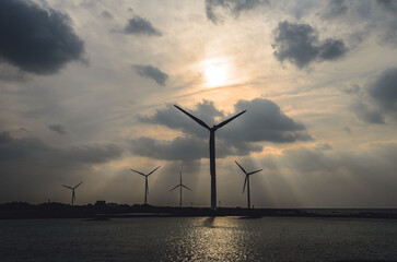 wind turbine at sunset
