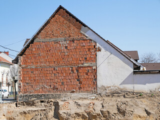 Old ruined house before demolition in the city