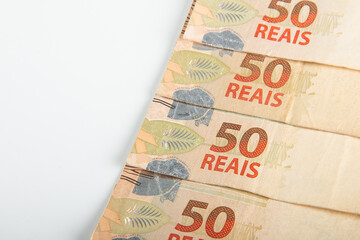 Brazilian money. 50 reais banknotes. Brazilian finance concept. Copy space.