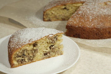 slice of cake with nuts close-up