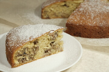slice of cake with nuts close-up