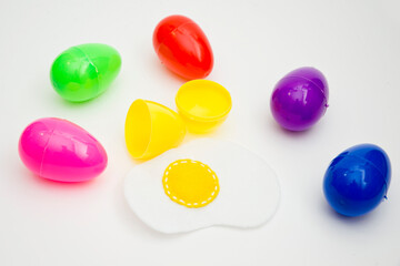 Happy Easter theme. Kid sorting eggs and learning colors. Montessori format task for kids education. Preschool toy for fine motor skils and training of imagination.