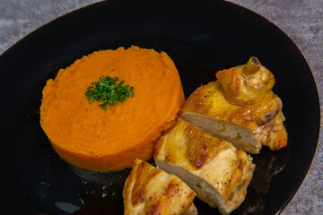 Chicken supreme recipe, gently cooked with 5 spices, sweet potato mousseline, peppers cut in half