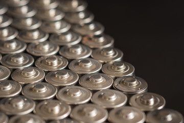 AA batteries background closeup view