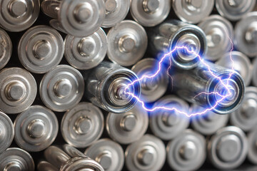 AA batteries background closeup view