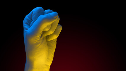 Fist in colors of Ukrainian Flag raised to fight and resist russian agression