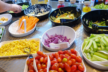 Fresh colorful vegetable and cereal on salad bar in restaurant