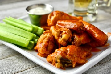 Buffalo wings with celery sticks