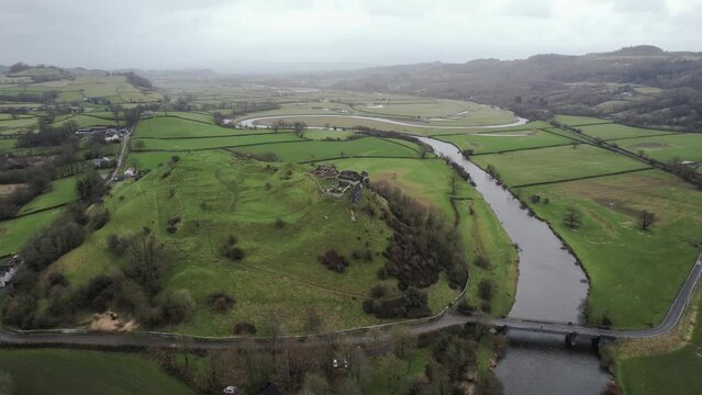 AERIAL: Wide circle of Dryslwyn Castle and snaking river, Carmarthen, 4k Drone