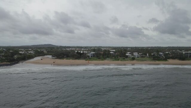 Aerial View Of The Coastline At Bargara Queensland Australia On A Cloudy Day - drone shot
