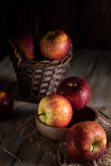 Red apples on a rustic table