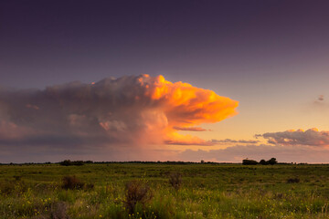 Stormy sky at sunset in the pampas field, La Pampa, Argentina.
