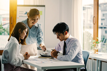 Obraz premium Young Asian business people meeting in boardroom, Business corporate people working concept