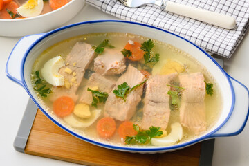 Trout fish in aspic with vegetables. Fish in jelly. Fish with gelatin