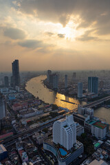 High angle view of the Chao Phraya River in the afternoon Surrounded by skyscrapers in the middle of Bangkok