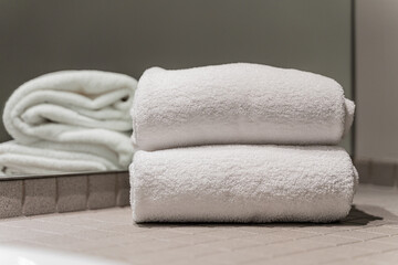 Fototapeta na wymiar stack of towels in a hotel bathroom
