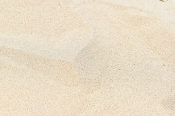 Fototapeta na wymiar Abstract close-up fine sand background texture