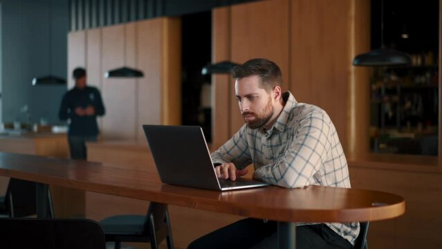 A fat IT guy writes a program, codes a mobile application, possibly a hacker