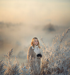  a girl in a beautiful winter nature