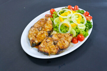 fish steak with vegetable salad for health lovers