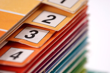 Colorful number register of a folder. Shallow depth of field