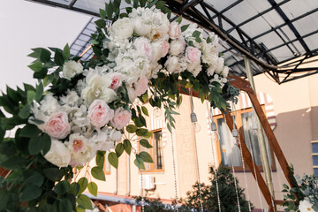 arch for wedding ceremony close-up with flowers