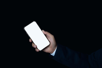 Businessman hand holding smartphone with blank white full screen.