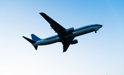 Fototapeta na wymiar Background of airplane flying in the sky