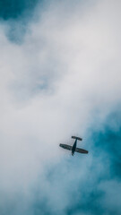 Small plane on blue sky background
