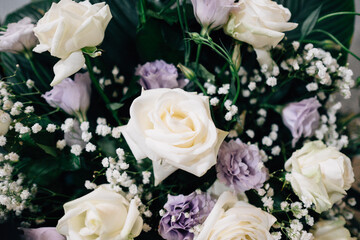 Top view selection of various colourful flowers displayed outdoors for wedding