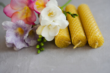 Set of Natural honey wax candles. Bouquet of freesias.