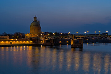 Fototapeta na wymiar Blue Hour at Sunset Over Toulouse With Garonne River Bridge and Chapel