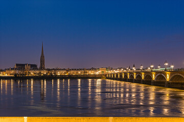 Twilight in Bordeaux Center With Stone Bridge Tramway and Basilica