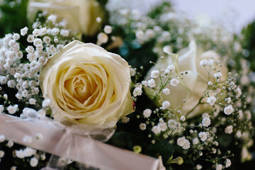 Natural yellow rose bouquet in natural lightning outdoors on display with blurry blank intentional background