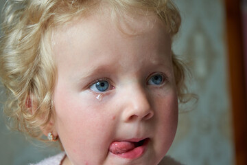 crying eyes of a little girl,portrait of a crying child with tears, sadness and children's pain