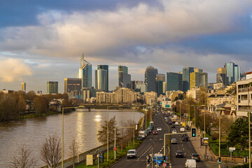 Sunny and Cloudy Morning Over La Defense District With Traffic and Seine River