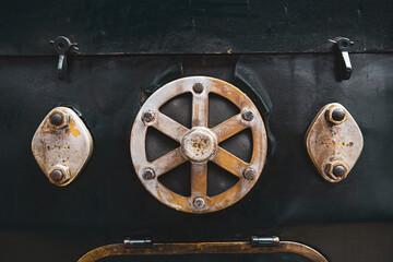 Fototapeta premium Metal parts, nuts, metal rods filled with oil and dust of steam locomotives