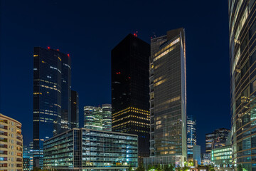 Fototapeta na wymiar Beautiful La Defense District Skyline at Night With Enlightened Towers