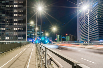 Enlightened Street With Traffic at Night in La Defense District in Paris