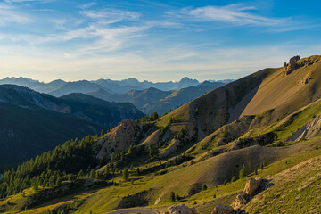 Enlightened French Alps Mountains at Golden Hour Sunset With Firs