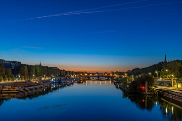 Obraz na płótnie Canvas Dawn With Blue Sky and Seine River in Paris Touristic Center