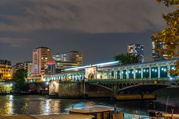 Famous Bir Hakeim Bridge in Paris Seine River and Boats Buildings