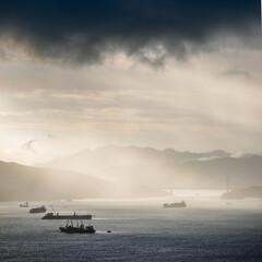 Obraz premium Container ships in ocean, South China Sea, Sunset