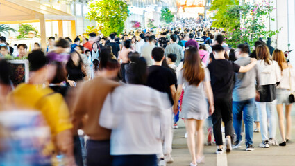 Crowd of people walking on the street