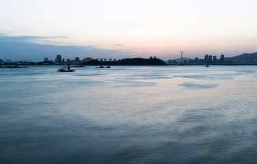 The city by the sea at sunset