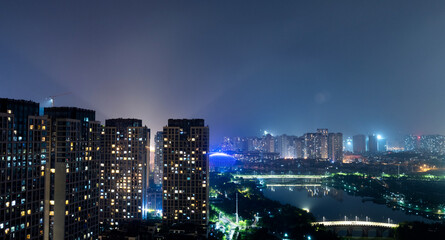 Obraz premium Modern apartments in the city at night