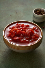 ingredients for pasta bolognese on a dark green background