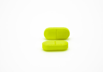 green pill isolate on white background